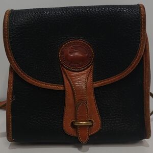 Dooney & Bourke Black and Tan Leather Backpack
